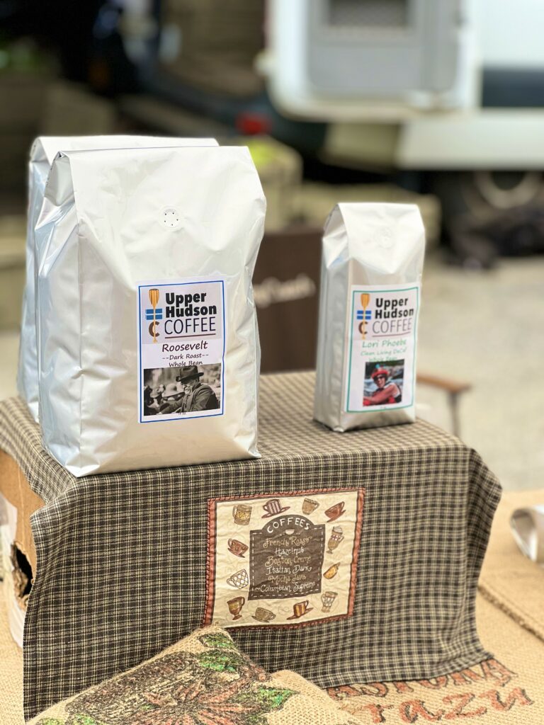 Two bags of Upper Hudson Coffee on display.