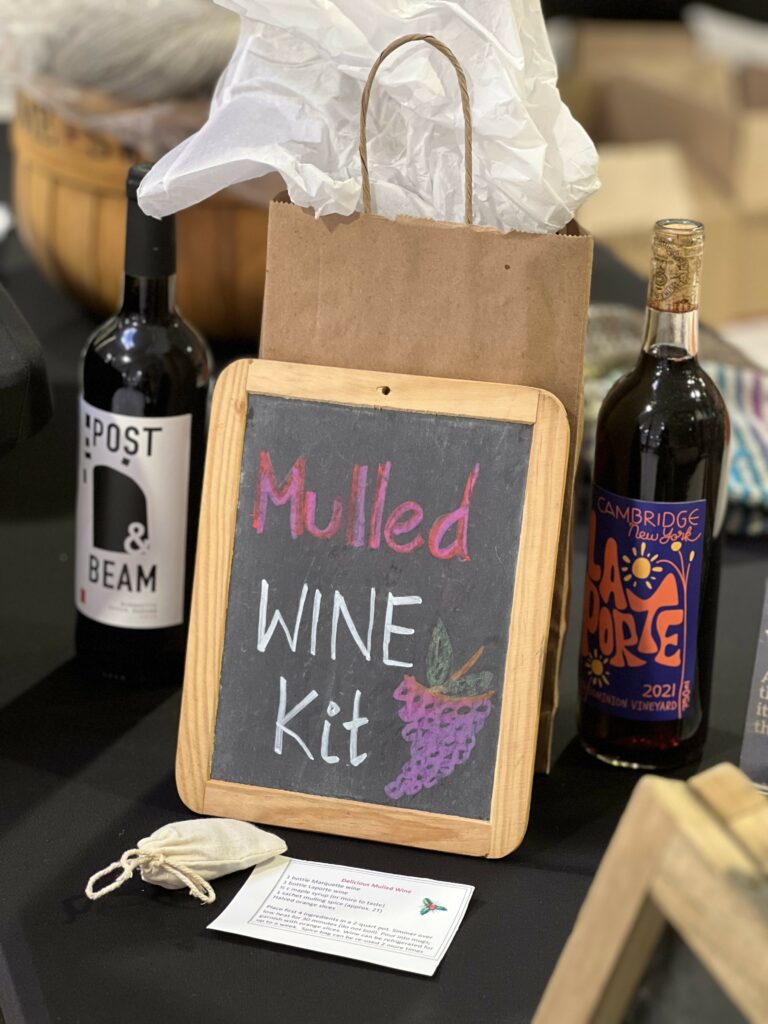 Mulled wine kit with bottles and instructional card displayed.
