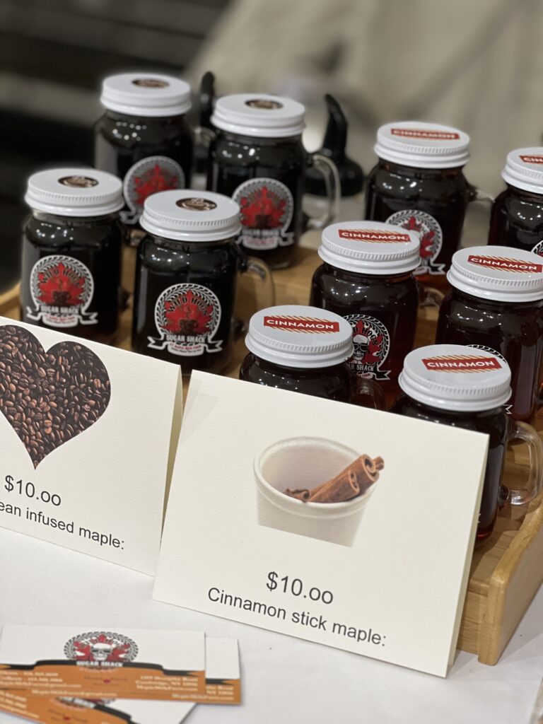 Maple syrup jars and price tags on display