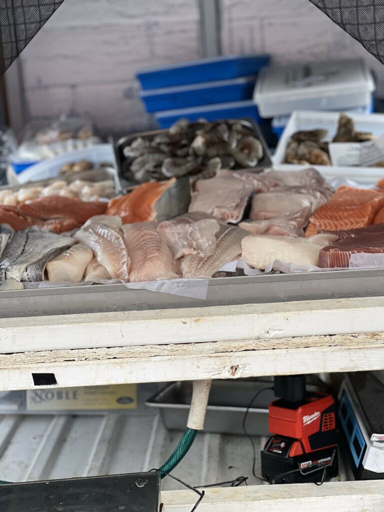 Fresh seafood assortment at market display.