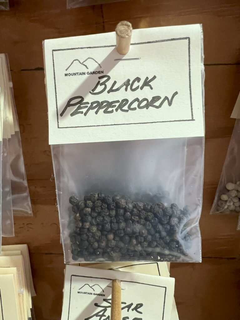 Packet of black peppercorns labeled "Mountain Garden.