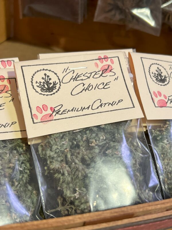 Packaged "Chester's Choice" premium catnip with pink paw prints.
