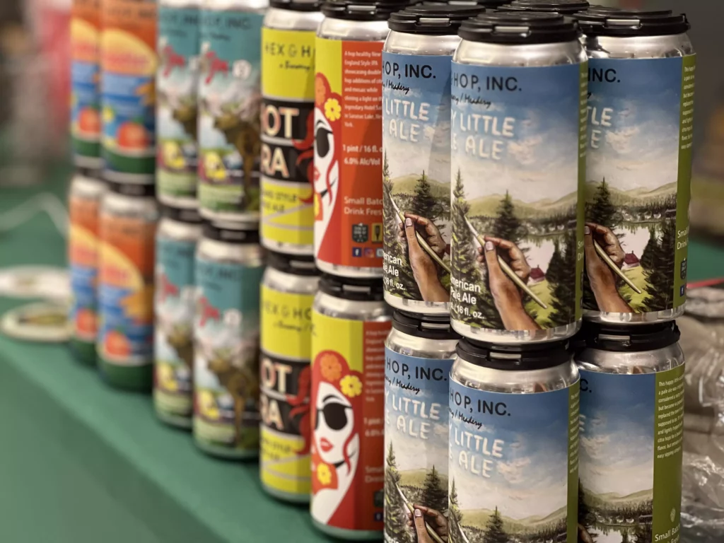 Assorted craft beer cans on display.